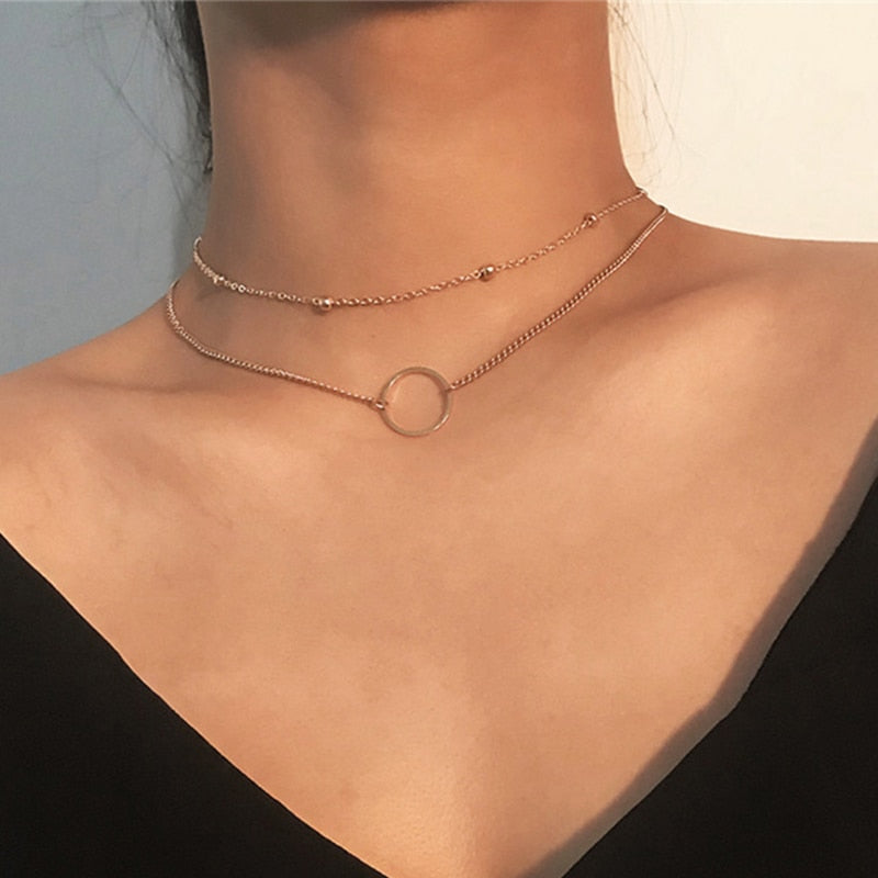 Collier avec pendentif étoile en cristal de zircon et cœur